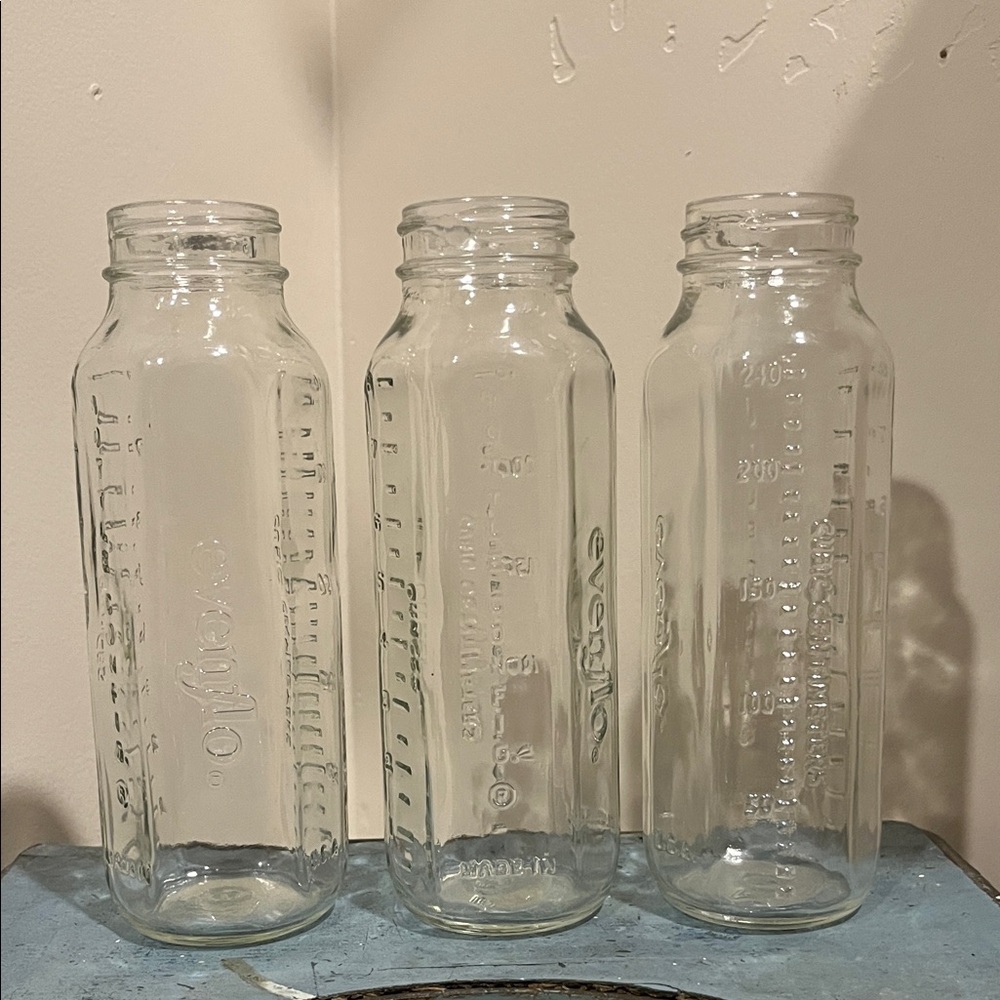 Evenflo glass USA baby bottles, set of 3. All are in excellent condition.